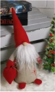 Santa gnome with a red hat & a bag of presents 14