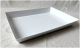 White rectangular metal tray with folding handles