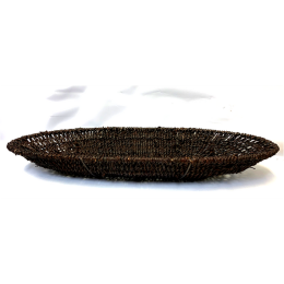 <p>Long boat shaped brown seagrass basket 17.5