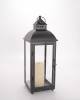Black metal & glass lantern 7"x7"x18"H 
Candle Excluded